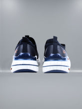 Sketchers - Max Cushioning Hyper Burst