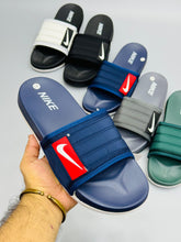 NKE - Air Jordan Slides featuring a sleek and iconic design, perfect for casual wear in Pakistan.
