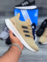 Beige Tan Adidas Ultraboost 5 running shoe side profile view