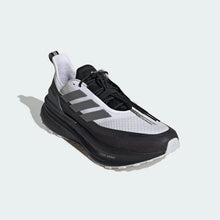 A single White Core Black Adidas Ultraboost 5 TR Shoe shown from a three-quarters angle on a light gray background.