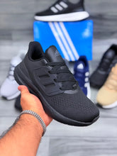 Triple Black Adidas Ultraboost 5 running shoe angled front view