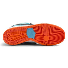 The outsole of a Nike sneaker, featuring a bright orange tread pattern with a light blue heel section and a white Nike logo embossed in the center.