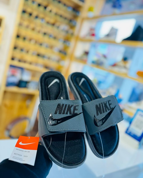 Nike slides original vs fake hotsell